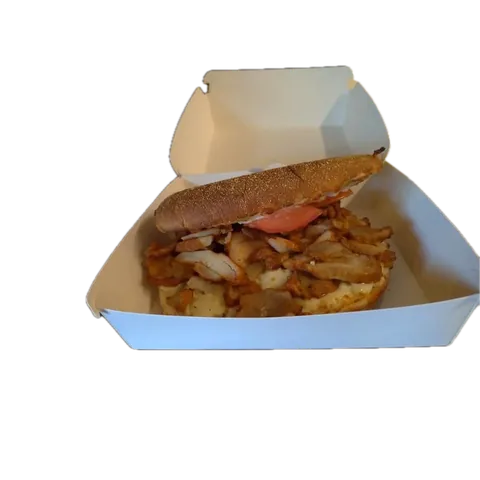 Le Kebab, sandwich pizza, vue d'en haut : pain à pizza, viande kebab, tomate, servi dans sa boîte